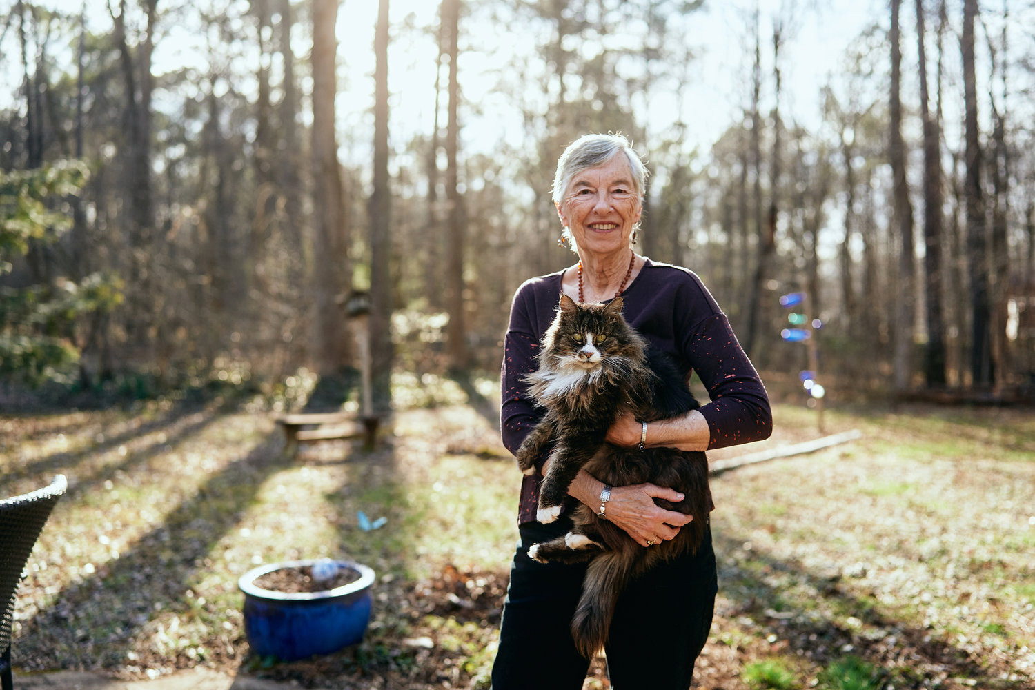 Marcia Herman-Giddens poses at her Chatham County home with her cat, Tuffy. A native of New York, she moved to Alabama in 1946, right before turning 6. In time, she came to understand she was living in the most segregated city in the country. 'The subjugation and inequities were clear to me even as a young child,' she says.